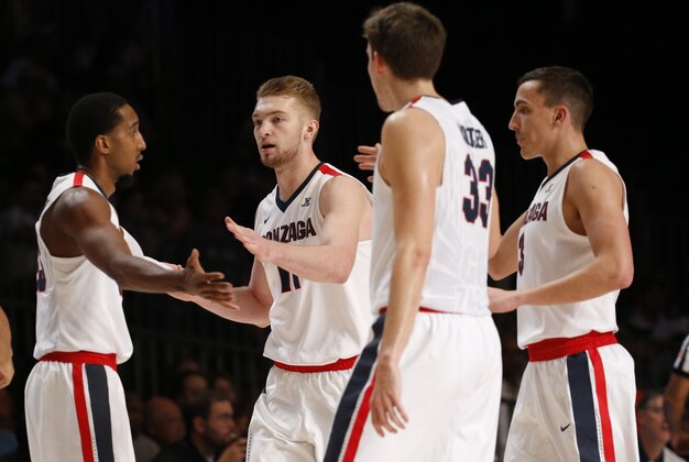 Nov 27, 2015; Paradise Island, BAHAMAS; Gonzaga Bulldogs forward Kyle Wiltjer (33) and forward Domantas Sabonis (11) celebrate with teammates in the first half against the Connecticut Huskies during the 2015 Battle 4 Atlantis in the Imperial Arena at the Atlantis Resort. Mandatory Credit: Kevin Jairaj-USA TODAY Sports