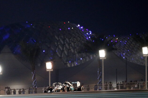 Mercedes driver Lewis Hamilton of Britain steers his car during the second training session at the Yas Marina racetrack in Abu Dhabi, United Arab Emirates, Friday, Nov. 27, 2015. The Emirates Formula One Grand Prix will take place on Sunday.  (AP Photo/Frank Augstein)