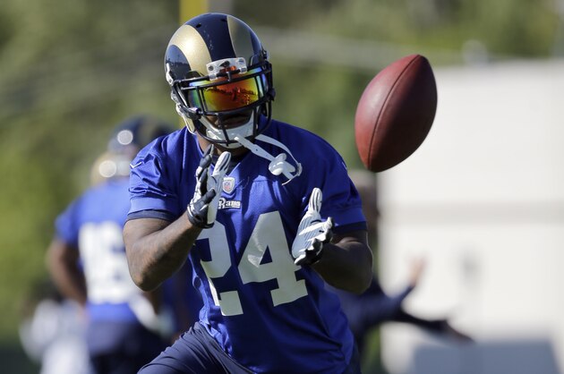 St. Louis Rams running back Isaiah Pead catches a ball during training camp at the NFL football team's practice facility Tuesday, Aug. 25, 2015, in St. Louis. (AP Photo/Jeff Roberson)