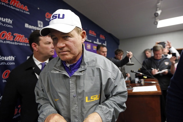 LSU head coach Les Miles leaves a media availability with reporters following an NCAA college football game against Mississippi in Oxford, Miss., Saturday, Nov. 21, 2015. No. 25 Mississippi won 38-17. (AP Photo/Rogelio V. Solis)