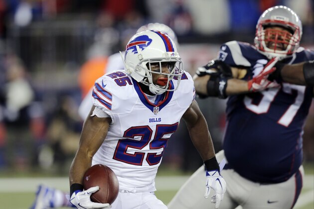 Buffalo Bills running back LeSean McCoy (25) runs past New England Patriots defensive tackle Alan Branch (97) in the first half of an NFL football game, Monday, Nov. 23, 2015, in Foxborough, Mass. (AP Photo/Charles Krupa)