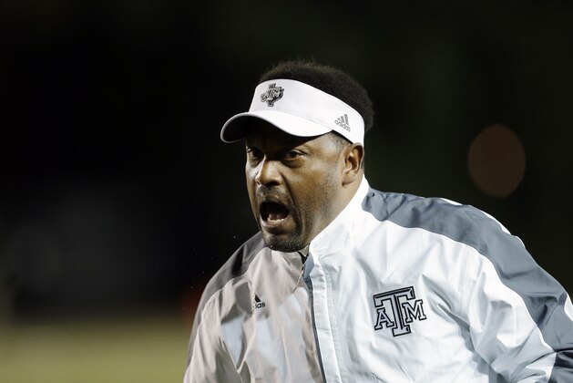 Texas A&M head coach Kevin Sumlin watches the action in the first half of an NCAA college football game against Vanderbilt Saturday, Nov. 21, 2015, in Nashville, Tenn. (AP Photo/Mark Humphrey)