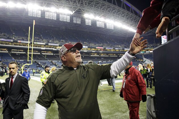 Arizona Cardinals head coach Bruce Arians leaves the field after an NFL football game against the Seattle Seahawks, Sunday, Nov. 15, 2015, in Seattle. The Cardinals beat the Seahawks 39-32. (AP Photo/Stephen Brashear)