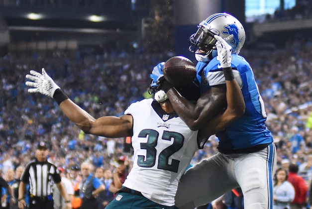 Nov 26, 2015; Detroit, MI, USA; Detroit Lions wide receiver Calvin Johnson (81) is unable to complete a pass while being pressured by Philadelphia Eagles cornerback Eric Rowe (32) during the second quarter of a NFL game on Thanksgiving at Ford Field. Mandatory Credit: Tim Fuller-USA TODAY Sports