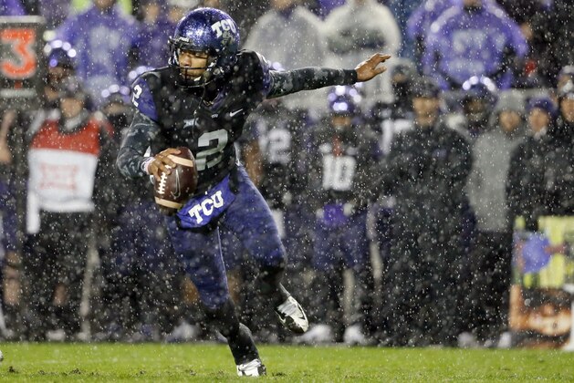 TCU quarterback Trevone Boykin scrambles out of the pocket in the first half of an NCAA college football game against Baylor, Friday, Nov. 27, 2015, in Fort Worth, Texas. (AP Photo/Tony Gutierrez)