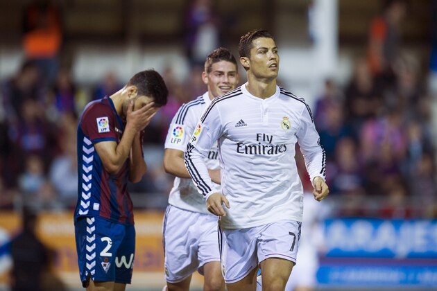 EIBAR, SPAIN - NOVEMBER 22:  Cristiano Ronaldo of Real Madrid celebrates after scoring during the La Liga match betweenÊSD Eibar andÊReal Madrid at Ipurua Municipal Stadium on November 22, 2014 in Eibar, Spain.  (Photo by Juan Manuel Serrano Arce/Getty Images)