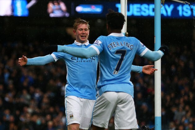 MANCHESTER, ENGLAND - NOVEMBER 28: Kevin de Bruyne (L) of Manchester City celebrates scoring his team's first goal with his team mate Raheem Sterling (R) during the Barclays Premier League match between Manchester City and Southampton at the Etihad Stadium on November 28, 2015 in Manchester, England.  (Photo by Michael Steele/Getty Images)
