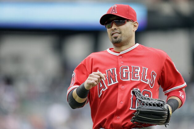 Los Angeles Angels left fielder Shane Victorino runs to the dugout during the fifth inning of a baseball game against the Detroit Tigers, Thursday, Aug. 27, 2015, in Detroit. (AP Photo/Carlos Osorio)