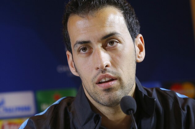 FC Barcelona's Sergio Busquets attends a press conference in Minsk, Belarus, Monday, Oct. 19, 2015.  FC Barcelona will play against  FC BATE Borisov in a Champions League group E soccer match on Tuesday Oct. 20. (AP Photo/Sergei Grits)