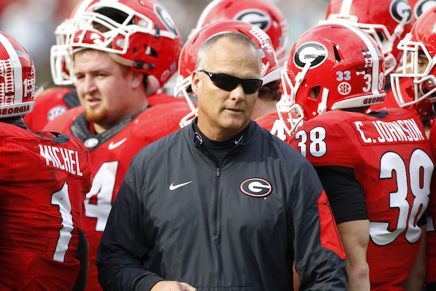 Georgia head coach walks out of a huddle during a timeout in the second half of an NCAA college football game against Georgia Tech on Saturday, Nov. 28, 2015, in Atlanta, Ga. Georgia won 13-7. (AP Photo/Brett Davis)