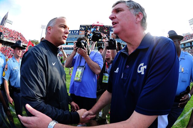ATLANTA, GA - NOVEMBER 28: Head Coach Mark Richt (L) of the Georgia Bulldogs is congratulated by Head Coach Paul Johnson of the Georgia Tech Yellow Jackets after the game at Bobby Dodd Stadium on November 28, 2015 in Atlanta, Georgia. (Photo by Scott Cunningham/Getty Images)