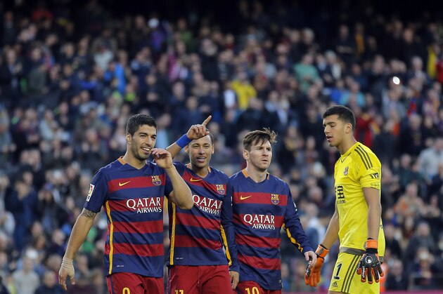 FC Barcelona's Neymar, second left, celebrates with his teammates Luis Suarez, left, and Lionel Messi, second right, after scoring against Real Sociedad during a Spanish La Liga soccer match at the Camp Nou stadium in Barcelona, Spain, Saturday, Nov. 28, 2015. (AP Photo/Manu Fernandez)