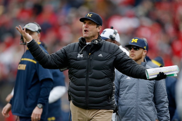 ANN ARBOR, MI - NOVEMBER 28:  Head coach Jim Harbaugh of the Michigan Wolverines reacts to a roughing the kicker call against his team during the first quarter against the Ohio State Buckeyes at Michigan Stadium on November 28, 2015 in Ann Arbor, Michigan.  (Photo by Gregory Shamus/Getty Images)