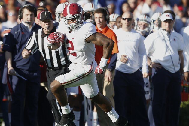 Alabama running back Derrick Henry (2) runs the ball during an NCAA college football game against Auburn, Saturday, Nov. 28, 2015, in Auburn, Ala. (AP Photo/Butch Dill)