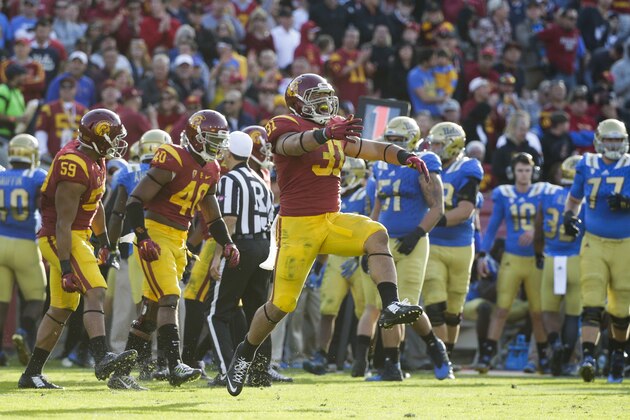 Southern California fullback Soma Vainuku, center, reacts to a play during the second half of an NCAA college football game against UCLA, Saturday, Nov. 28, 2015, in Los Angeles. USC won 41-20. (AP Photo/Jae C. Hong) Southern California fullback Soma Vainuku, center, reacts to a play during the second half of an NCAA college football game against UCLA, Saturday, Nov. 28, 2015, in Los Angeles. USC won 41-20. (AP Photo/Jae C. Hong)