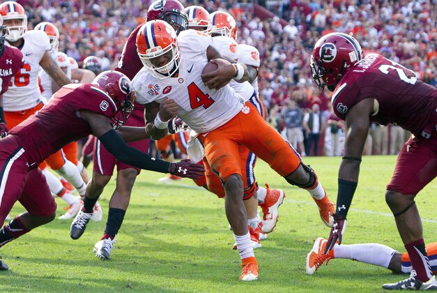 Nov 28, 2015; Columbia, SC, USA;  Clemson Tigers quarterback Deshaun Watson (4) carries for a touchdown during the second half against the South Carolina Gamecocks at Williams-Brice Stadium. Mandatory Credit: Joshua S. Kelly-USA TODAY Sports