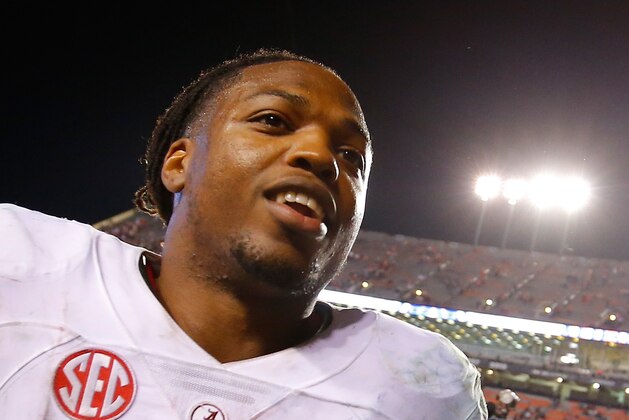 AUBURN, AL - NOVEMBER 28:  Derrick Henry #2 of the Alabama Crimson Tide runs off the field after their 29-13 win over the Auburn Tigers at Jordan Hare Stadium on November 28, 2015 in Auburn, Alabama.  (Photo by Kevin C. Cox/Getty Images)