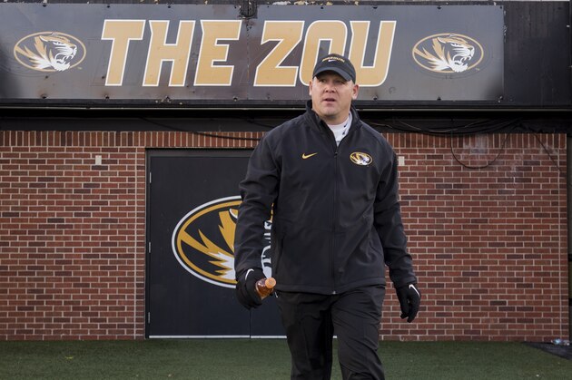 Missouri defensive coordinator Barry Odom walks on the field before the start of their NCAA college football game against Tennessee Saturday, Nov. 21, 2015, in Columbia, Mo. (AP Photo/L.G. Patterson)