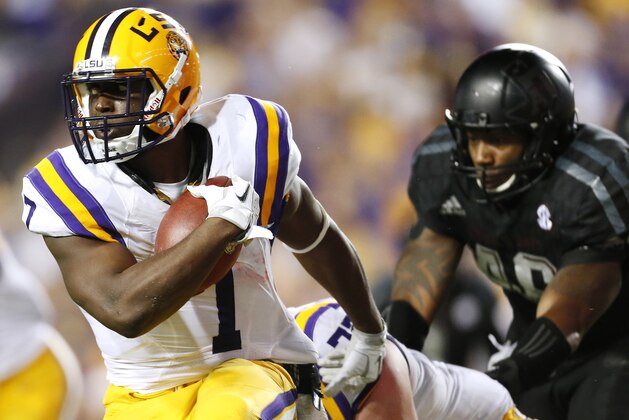 LSU running back Leonard Fournette (7) runs with the ball during the first half an NCAA college football game against Texas A&M in Baton Rouge, La., Saturday, Nov. 28, 2015. (AP Photo/Jonathan Bachman)