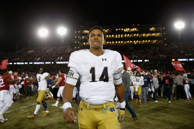 PALO ALTO, CA - NOVEMBER 28:  DeShone Kizer #14 of the Notre Dame Fighting Irish walks off the field after they lost to the Stanford Cardinal on a last-second field goal at Stanford Stadium on November 28, 2015 in Palo Alto, California.  (Photo by Ezra Shaw/Getty Images)