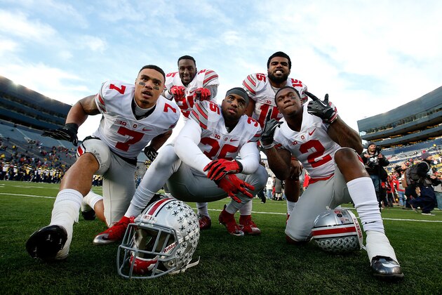 ANN ARBOR, MI - NOVEMBER 28:  Ezekiel Elliott #15, Bri'onte Dunn #25, Jalin Marshall #7, Chris Worley #35 and Dontre Wilson #2 of the Ohio State Buckeyes celebrate a 42-13 win over the Michigan Wolverines at Michigan Stadium on November 28, 2015 in Ann Arbor, Michigan.  (Photo by Gregory Shamus/Getty Images)