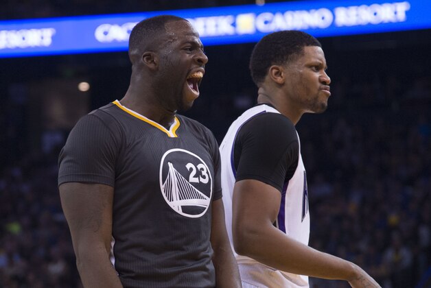 November 28, 2015; Oakland, CA, USA; Golden State Warriors forward Draymond Green (23) celebrates against Sacramento Kings forward Rudy Gay (8) during the second quarter at Oracle Arena. Mandatory Credit: Kyle Terada-USA TODAY Sports