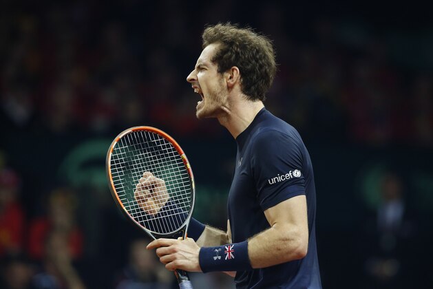 Britain's Andy Murray clenches his fist after scoring in the first set against Britain's Andy Murray during their singles Davis Cup final tennis match at the Flanders Expo in Ghent, Belgium, Sunday, Nov. 29, 2015. (AP Photo/Alastair Grant)