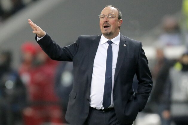 Real Madrid's coach Rafael Benitez gives instructions to his players during the Champions League Group A soccer match between FC Shakhtar and Real Madrid at Arena Lviv stadium in Lviv, Western Ukraine, Wednesday, Nov. 25, 2015. (AP Photo/Efrem Lukatsky)
