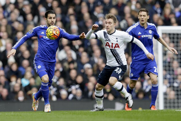 Chelsea’s Cesc Fabregas, left, competes for the ball with Tottenham’s Christian Eriksen during the English Premier League soccer match between Tottenham Hotspur and Chelsea at White Hart Lane in London, Sunday Nov. 29, 2015. (AP Photo/Tim Ireland)