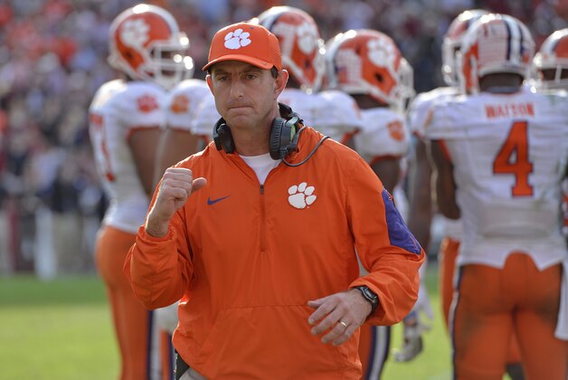 Clemson head coach Dabo Swinney reacts in the closing minutes of an NCAA college football game against South Carolina Saturday,  Nov. 28, 2015,  in Columbia,  S.C. Clemson won 37-32. (AP Photo/Richard Shiro)