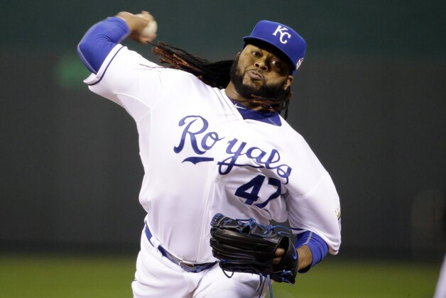 Kansas City Royals pitcher Johnny Cueto throws during the first inning of Game 2 of the Major League Baseball World Series against the New York Mets Wednesday, Oct. 28, 2015, in Kansas City, Mo. (AP Photo/David Goldman)