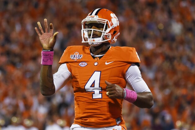 Clemson quarterback Deshaun Watson (4) waves to fans after scoring a touchdown against Boston College during the first half of an NCAA college football game, Saturday, Oct. 17, 2015, in Clemson, S.C. (AP Photo/Rainier Ehrhardt)