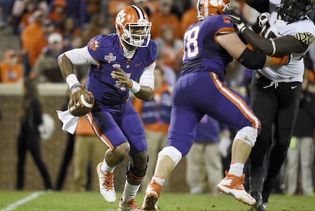 Clemson quarterback Deshaun Watson (4) runs the ball during the second half of an NCAA college football game against Wake Forest on Saturday, Nov. 21, 2015, in Clemson, S.C. (AP Photo/Rainier Ehrhardt)