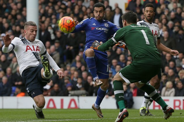 Tottenham’s Toby Alderweireld, left, clears the ball from Chelsea’s Pedro, centre, during the English Premier League soccer match between Tottenham Hotspur and Chelsea at White Hart Lane in London, Sunday Nov. 29, 2015. (AP Photo/Tim Ireland)