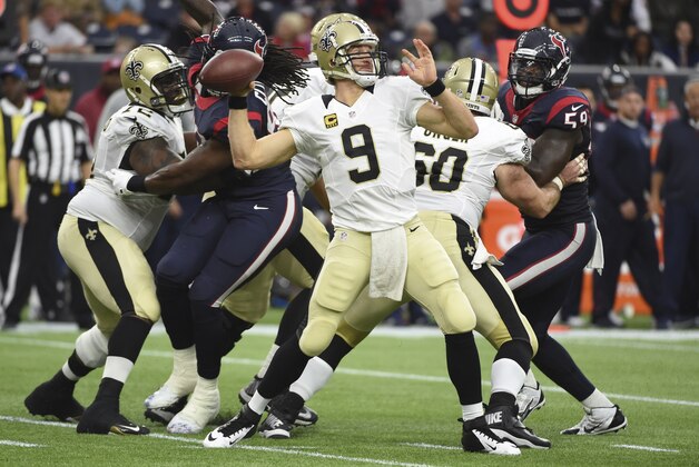 New Orleans Saints quarterback Drew Brees (9) throws a pass against the Houston Texans during the second quarter of an NFL football game, Sunday, Nov. 29, 2015, in Houston. (AP Photo/Eric Christian Smith)
