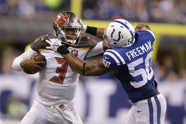 Indianapolis Colts inside linebacker Jerrell Freeman (50) tackles Tampa Bay Buccaneers quarterback Jameis Winston (3) during the second half of an NFL football game in Indianapolis, Sunday, Nov. 29, 2015. (AP Photo/Darron Cummings)