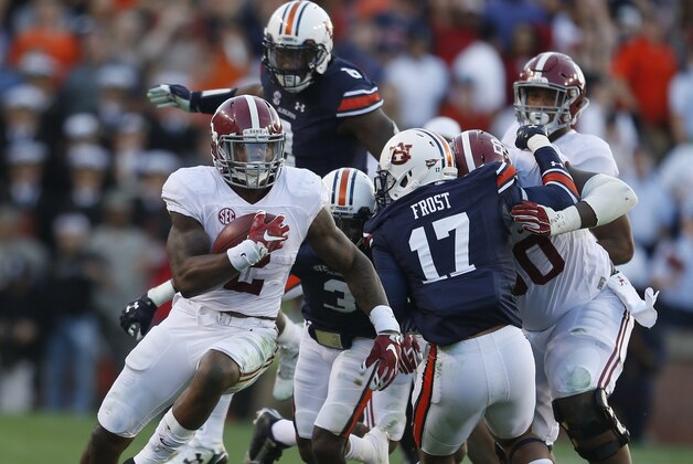 Alabama running back Derrick Henry (2) runs the ball during an NCAA college football game against Alabama, Saturday, Nov. 28, 2015, in Auburn, Ala. Alabama won 29-13. (AP Photo/Butch Dill) Alabama running back Derrick Henry (2) runs the ball during an NCAA college football game against Alabama, Saturday, Nov. 28, 2015, in Auburn, Ala. Alabama won 29-13. (AP Photo/Butch Dill)