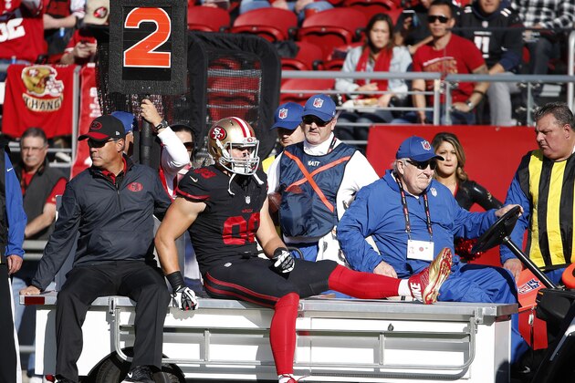San Francisco 49ers tight end Garrett Celek (88) is carted off the field during the first half of an NFL football game against the Arizona Cardinals in Santa Clara, Calif., Sunday, Nov. 29, 2015. (AP Photo/Tony Avelar)