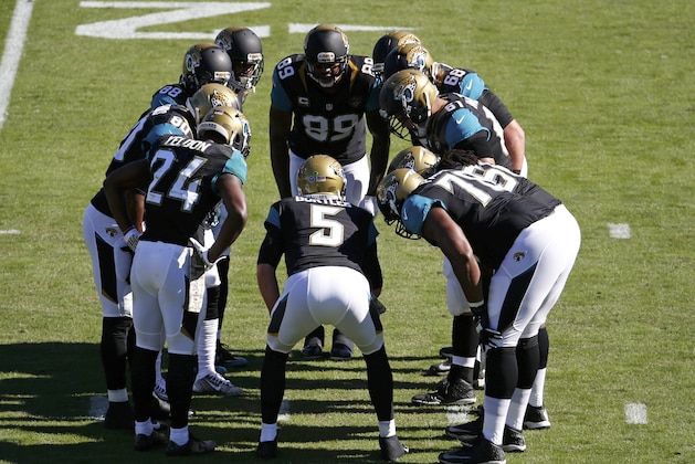 Jacksonville Jaguars quarterback Blake Bortles (5) calls a play int he huddle during the first half of an NFL football game against the San Diego Chargers in Jacksonville, Fla., Sunday, Nov. 29, 2015.(AP Photo/Stephen B. Morton)