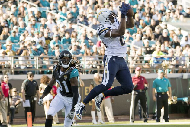 Nov 29, 2015; Jacksonville, FL, USA; San Diego Chargers tight end Antonio Gates (85) catches a touchdown pass as Jacksonville Jaguars cornerback Davon House (31) looks on during the second quarter at EverBank Field. Mandatory Credit: Logan Bowles-USA TODAY Sports