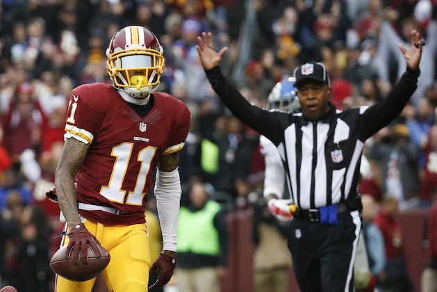 Washington Redskins wide receiver DeSean Jackson (11) carries the ball into the end zone for a touchdown during the first half of an NFL football game against the New York Giants in Landover, Md., Sunday, Nov. 29, 2015. (AP Photo/Alex Brandon)