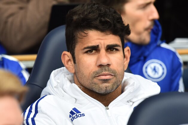 Chelsea's Brazilian-born Spanish striker Diego Costa sits on the bench before the English Premier League football match between Tottenham Hotspur and Chelsea at White Hart Lane in north London on November 29, 2015.     AFP PHOTO / BEN STANSALL

RESTRICTED TO EDITORIAL USE. No use with unauthorized audio, video, data, fixture lists, club/league logos or 'live' services. Online in-match use limited to 75 images, no video emulation. No use in betting, games or single club/league/player publications. / AFP / BEN STANSALL        (Photo credit should read BEN STANSALL/AFP/Getty Images)
