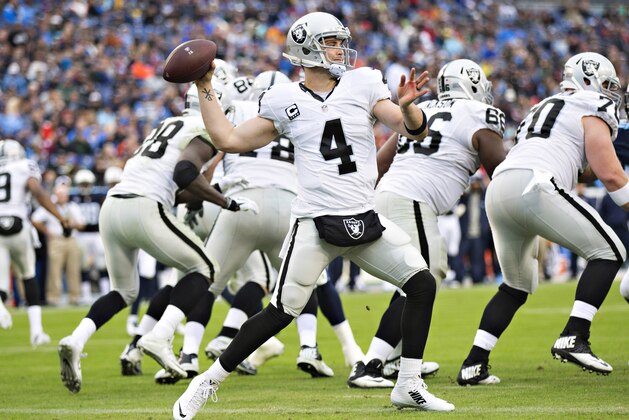 NASHVILLE, TN - NOVEMBER 29:  Derek Carr #4 of the Oakland Raiders throws a pass from the end zone during a game against the Tennessee Titans at Nissan Stadium on November 29, 2015 in Nashville, Tennessee.  (Photo by Wesley Hitt/Getty Images)