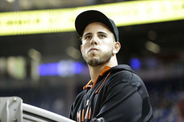 Miami Marlins' Jose Fernandez looks out of the dugout during the ninth inning of a baseball game against the Milwaukee Brewers, Wednesday, Sept. 9, 2015, in Miami. The Marlins defeated the Brewers 5-2. (AP Photo/Wilfredo Lee)