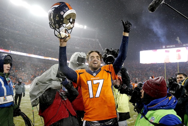 Denver Broncos quarterback Brock Osweiler (17) celebrates after an NFL football game against the New England Patriots, Sunday, Nov. 29, 2015, in Denver. The Broncos defeated the Patriots 30-24. (AP Photo/Jack Dempsey)
