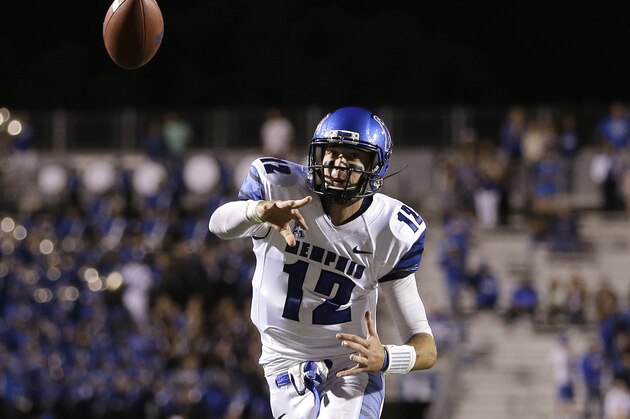Memphis quarterback Paxton Lynch passes against Middle Tennessee in the fourth quarter in an NCAA college football game on Saturday, Sept. 14, 2013, in Murfreesboro, Tenn. (AP Photo/Mark Humphrey)