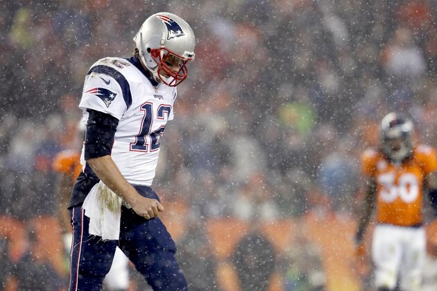 New England Patriots quarterback Tom Brady (12) walks to the sidelines against the Denver Broncos during the second half of an NFL football game, Sunday, Nov. 29, 2015, in Denver. (AP Photo/Joe Mahoney)