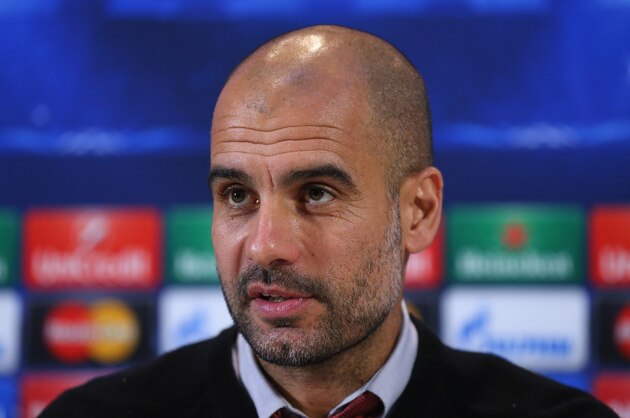 MANCHESTER, ENGLAND - NOVEMBER 24:  Pep Guardiola the coach of FC Bayern Muenchen faces the media during a press conference at the Lowry Hotel on November 24, 2014 in Manchester, United Kingdom.  (Photo by Alex Livesey/Getty Images)