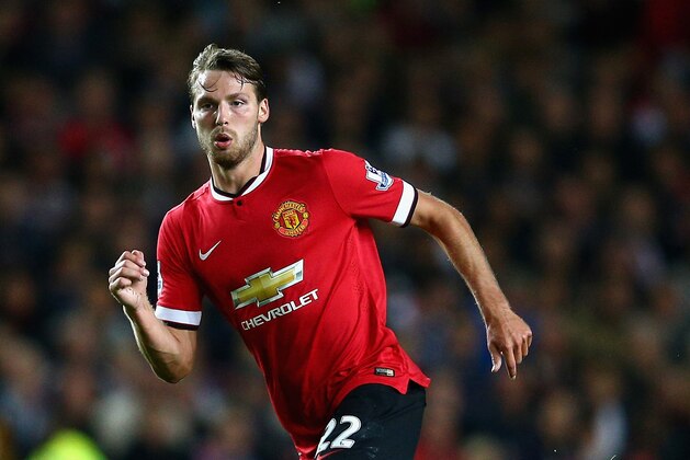 MILTON KEYNES, ENGLAND - AUGUST 26:  Nick Powell of Manchester United in action during the Capital One Cup second round match between MK Dons and Manchester United at Stadium mk on August 26, 2014 in Milton Keynes, England.  (Photo by Clive Mason/Getty Images)
