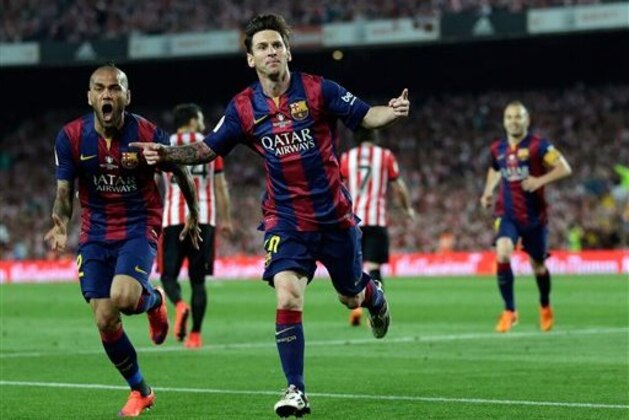 FILE - In this Saturday, May 30, 2015 file photo, Barcelona's Lionel Messi, centre,  celebrates after scoring the opening goal during the final of the Copa del Rey soccer match between FC Barcelona and Athletic Bilbao at the Camp Nou stadium in Barcelona, Spain. Carli Lloyd and Lionel Messi are among the nominees for the FIFA Puskas Award for goal of the year. Lloyd scored for the United States from 50 yards against Japan in the Women’s World Cup final. Messi beat four defenders before scoring Barcelona’s first goal against Athletic Bilbao in the Copa del Rey final. (AP Photo/Manu Fernandez, File)